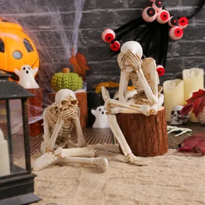 Halloween resin skeleton figurines featuring See-No-Evil and Speak-No-Evil poses for decor