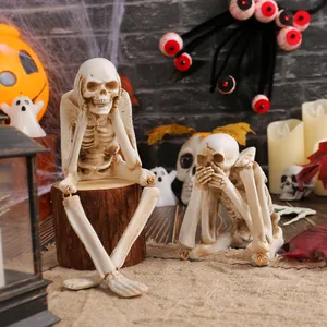 Halloween resin skeleton figurines in Hear No Evil and Speak No Evil poses for decor