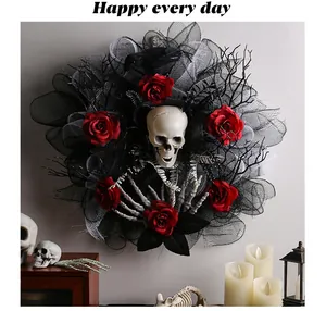 Detailed view of Halloween wreath with realistic skull centerpiece and gothic red roses