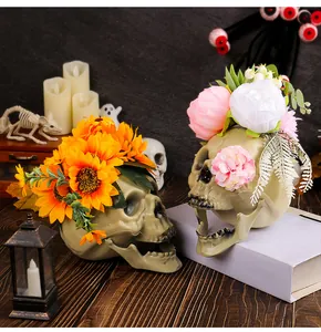 Halloween skull prop decorated with sunflowers and peonies for haunted house decoration