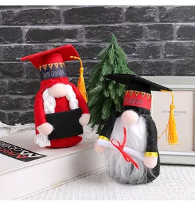 Close-up of cute graduation gnomes wearing mortarboards and tassels for desk decor