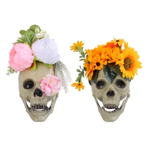 Halloween decorative skull props featuring sunflower and pink peony flower crowns