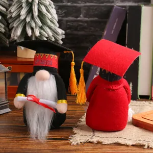 Handmade graduation gnome faceless dolls with graduation caps for festive desktop decor
