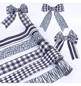 Variety of black and white patterned ribbons featuring leopard and zebra prints