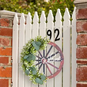 Couronne de roue de wagon rustique avec feuilles vertes et signe Welcome pour décoration de porte