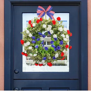 Detailed view of Fourth of July front door wreath with red, white, and blue roses.