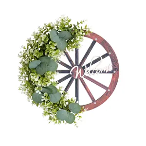 Couronne de roue de chariot rustique avec feuilles d'eucalyptus et décor Welcome