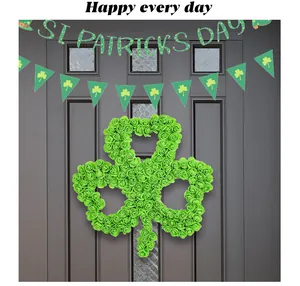 Detailed macro view of a green rose shamrock wreath for St. Patrick's Day home door decor