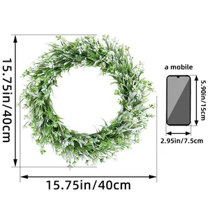 Decorative artificial spring green plant wreath with white flowers 15.75 inch diameter