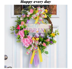 Couronne de fleurs printanière colorée avec panneau Hello Spring et rubans sur porte