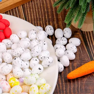 Assorted miniature speckled Easter eggs set on a white plate for holiday home decor