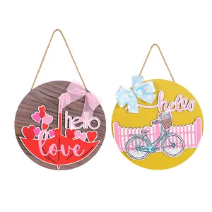 Set van 2 romantische houten deurhangers voor Valentijnsdag met decoratieve strikken