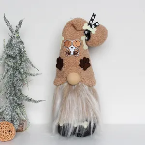 Detailed close-up of a dog-themed plush gnome with bone and paw print decorations