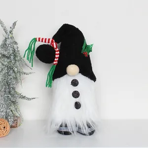 Detailed view of a festive standing Christmas gnome with a black hat and a plush white beard