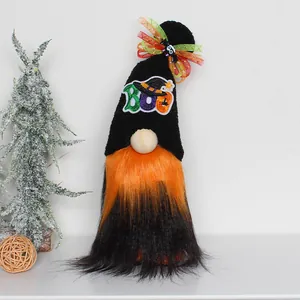 Close-up of a Halloween gnome with a BOO hat and orange black faux fur beard
