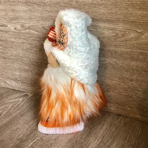 Handmade autumn faceless gnome doll with Hello Pumpkin tag for Halloween seasonal decor