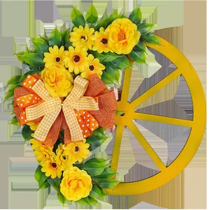 Charmanter Frühlings-Wagenradkranz mit gelben Blumen und einer orangefarbenen Schleife