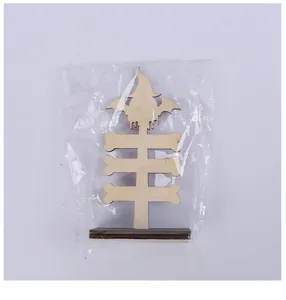 Halloween wooden bone-shaped desktop sign with witch hat detail in plastic wrap