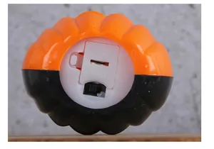 Detailed view of the bottom of the Halloween pumpkin lantern battery compartment