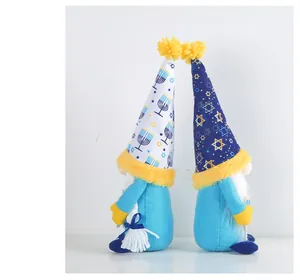 Detail of Hanukkah plush gnome dolls featuring Menorah and Star of David hat designs
