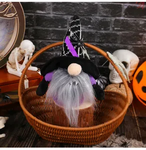 Halloween vampire gnome plush doll decoratively displayed in a rustic brown wicker basket