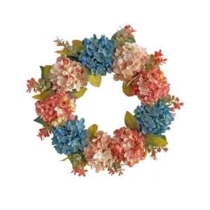 Artificial hydrangea wreath in blue and pink for festive wall and door decoration