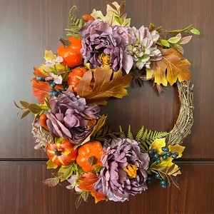 Autumn harvest wreath featuring purple peonies and orange pumpkins for front door decor
