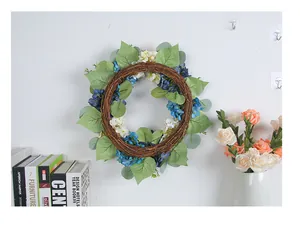 Blue and white artificial hydrangea wreath on grapevine base for wall and door decor