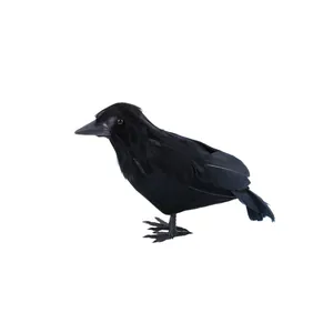 Realistic black feathered crow decoration prop for Halloween themed parties and events