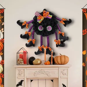 Creative Halloween spider door hanging with witch legs and orange bows party decor