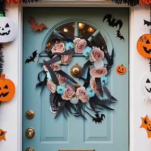 Halloween wreath with pink roses and blue pumpkins on a light blue door