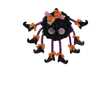 Whimsical Halloween spider door hanging wreath with striped legs and polka dot bows