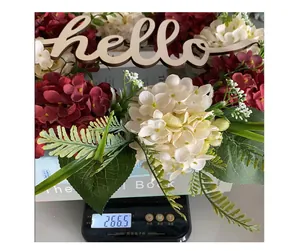 Close-up of the artificial hydrangea floral wreath showing its lightweight 266.5g