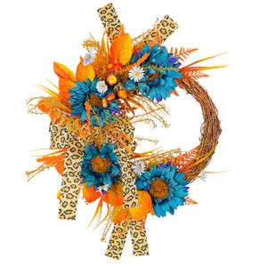 Couronne de tournesols bleus artificiels avec rubans léopard et feuilles orange
