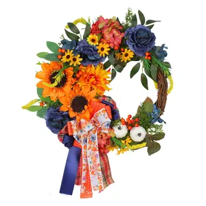 Vibrant fall wreath with blue roses, sunflowers, white pumpkins, and festive ribbons decoration