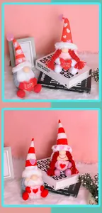 Close-up detail of cute Valentine's Day gnomes holding hearts and envelopes plush decor