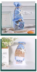Detailed view of handmade nautical gnomes with starfish holding Beach Life placards