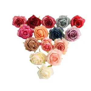 Set of multi-colored artificial silk rose heads for DIY crafts and wedding decor