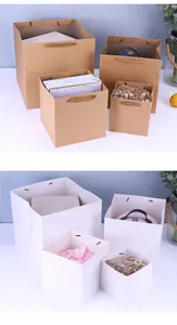 Detail view showing brown and white square kraft paper bags in various sizes with items