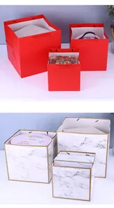 Premium square paper gift bags in red and white marble designs, available in three sizes