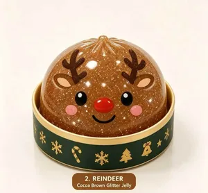 Close-up of cocoa brown reindeer glitter jelly squishy toy in a festive gift box