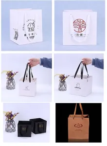 High-quality square kraft paper gift packaging bags with ribbon handles for bakery items.