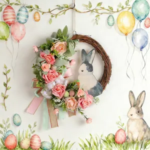 Festlicher Osterkranz aus Reben mit rosa Rosen und Hasendekoration für die Wand