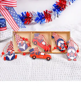 Detail view of American Independence Day wooden gnome and truck ornaments in a box