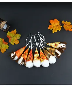 Set of 7 plush harvest gnomes with autumn sunflower and plaid patterns for fall decor