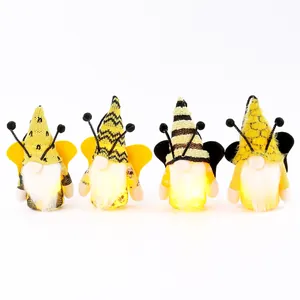 Lot de quatre nains de festival d'abeilles lumineux faits main avec rayures et ailes