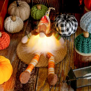 Glowing Fall harvest gnome with long legs and maple leaf hat for autumn decor