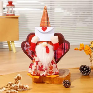 Handcrafted Thanksgiving turkey gnome doll with maple leaf pattern for fall decor