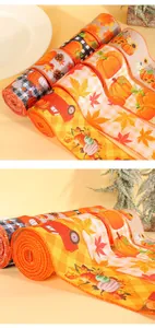 Detailed view of Thanksgiving ribbons featuring pumpkin, maple leaf, and truck prints