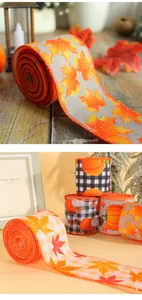 Detailed view of Thanksgiving burlap ribbon with autumn pumpkin and maple leaf prints